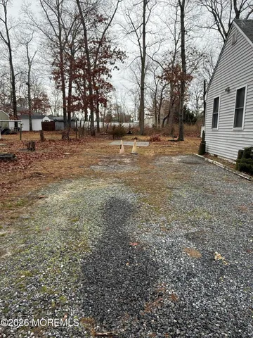 a view of outdoor space with deck and tree