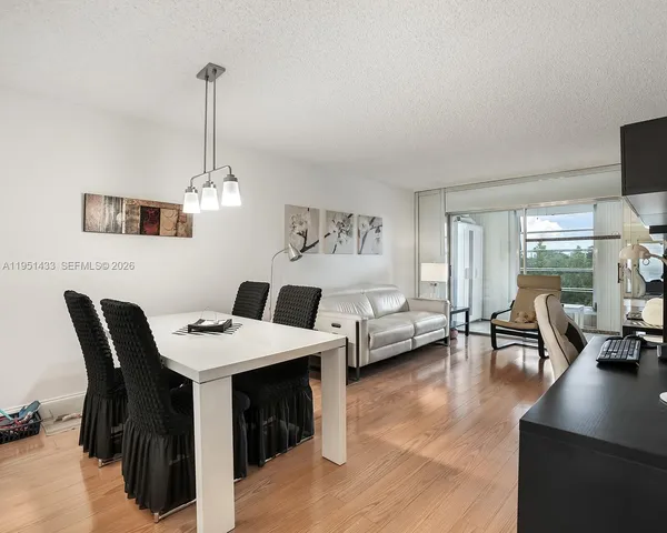 a view of a livingroom and dining room