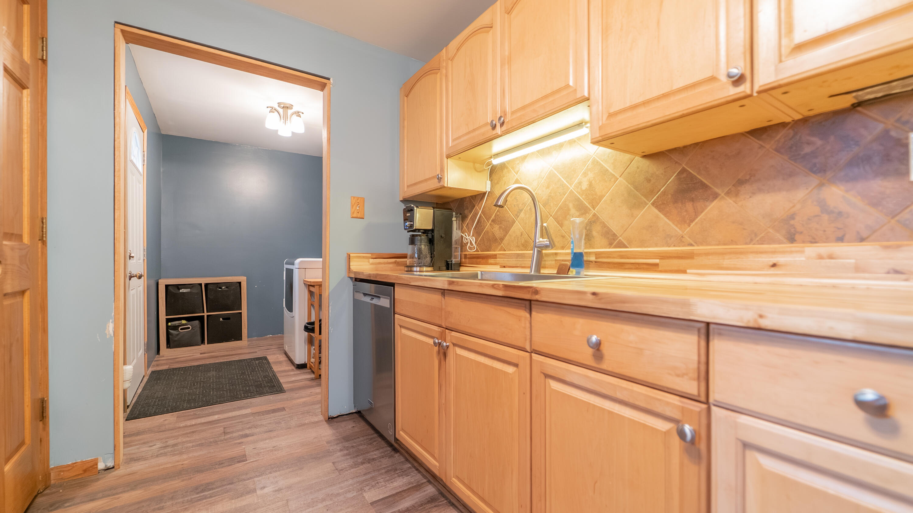 3161 Pulaski Street Hobart, IN 46342 - Photo 9 of 22 a bathroom with a sink and a mirror