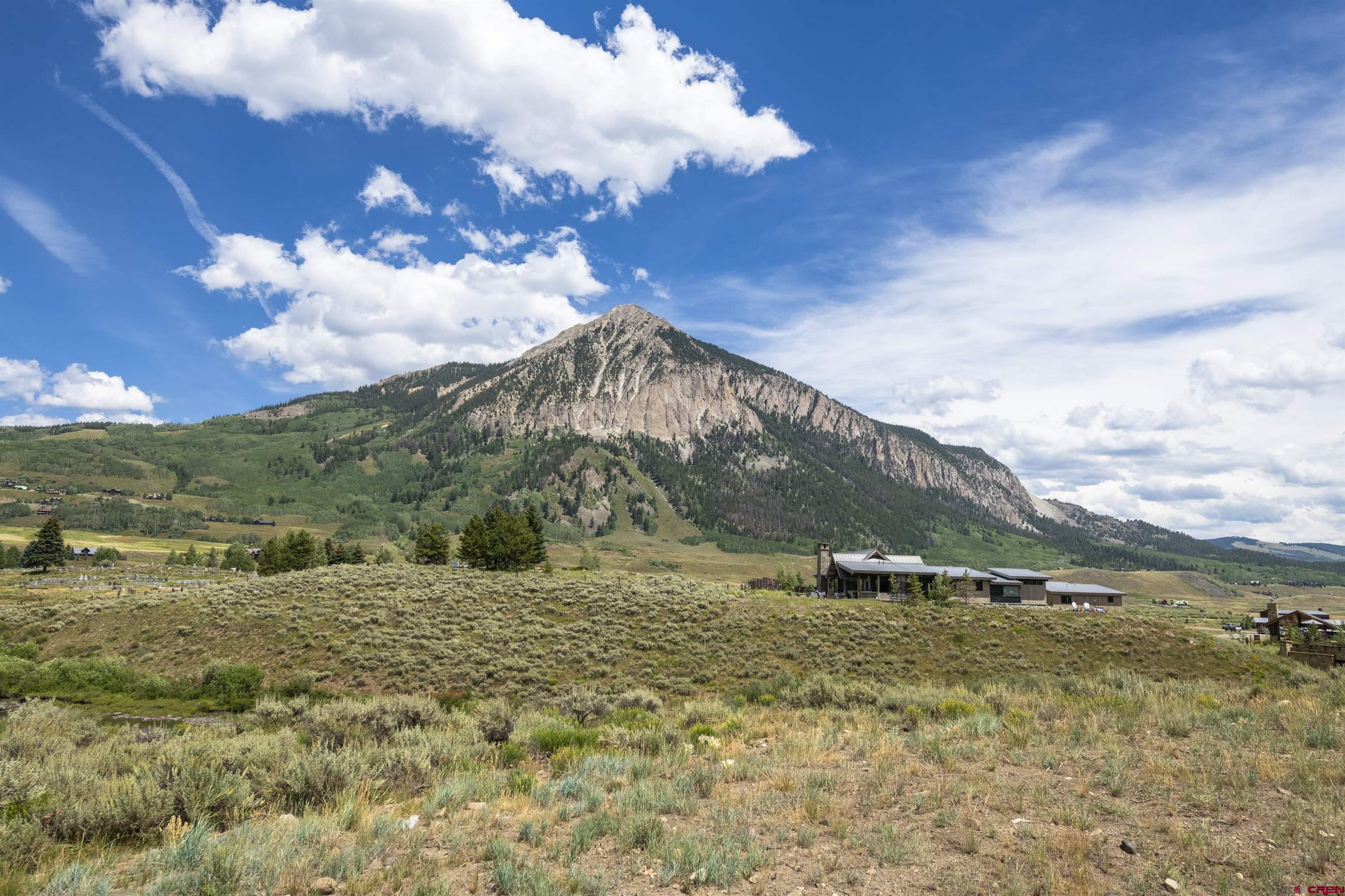55 Pyramid Avenue Crested Butte, CO 81224 - Photo 2 of 35 a view of a field with an ocean