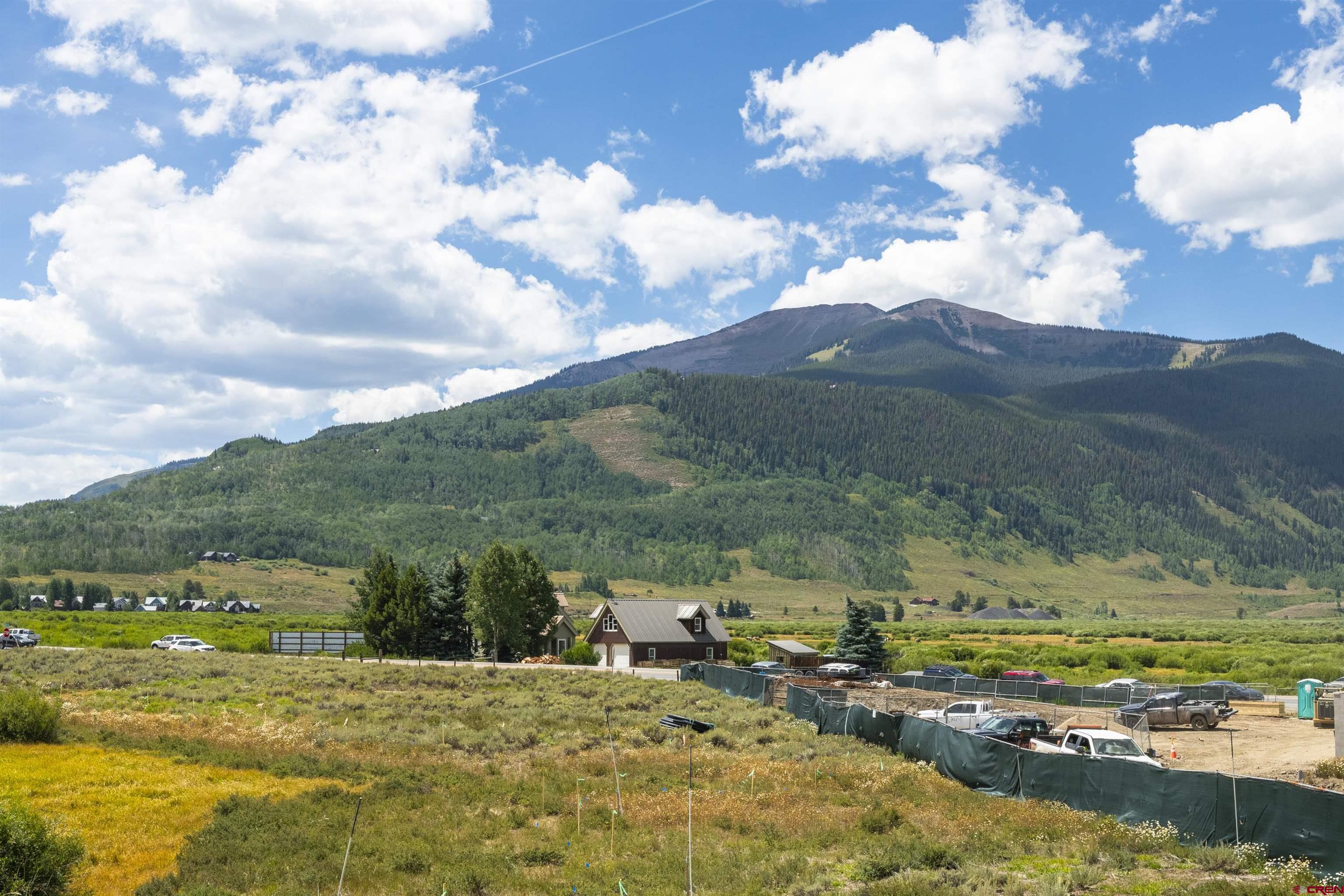 55 Pyramid Avenue Crested Butte, CO 81224 - Photo 27 of 35 a view of a lake with a mountain