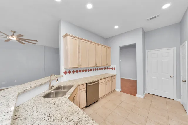 a room with a bed and a window