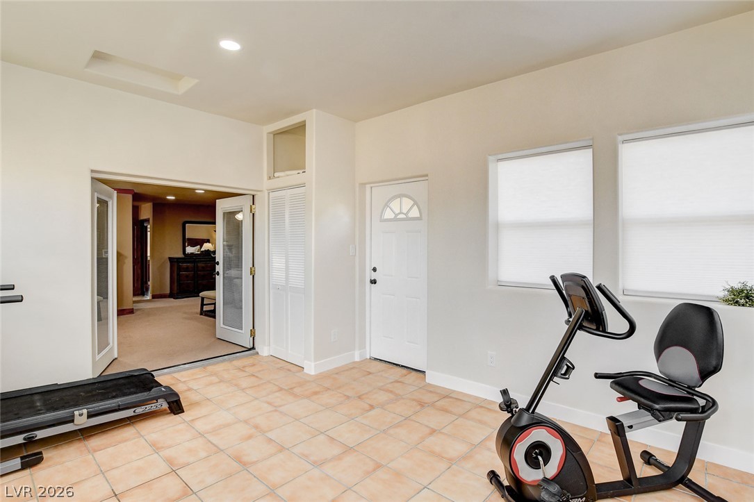 1950 Bowman Road Logandale, NV 89021 - Photo 35 of 81 A versatile bonus Arizona room offers ample space for a home gym or additional living area.