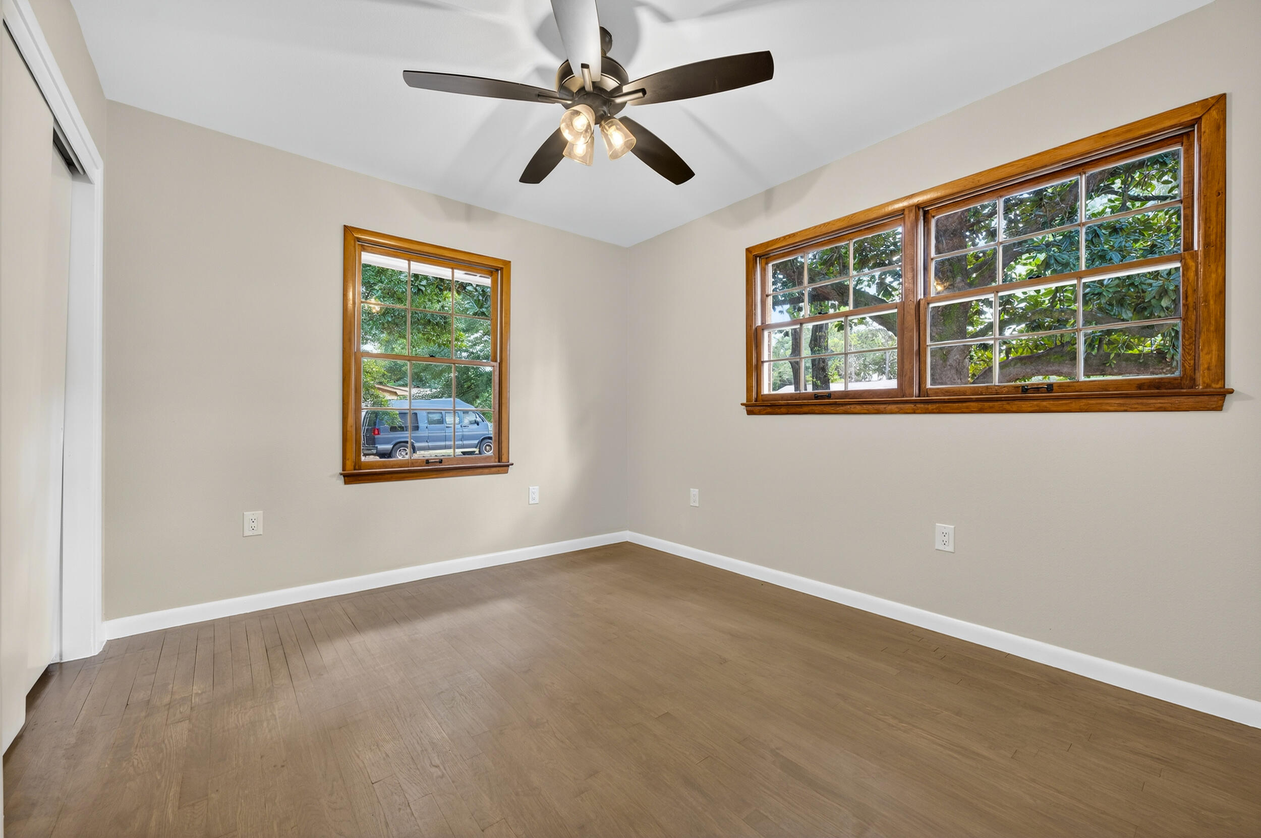 758 9th Avenue Crestview, FL 32536 - Photo 29 of 55 an empty room with windows and fan