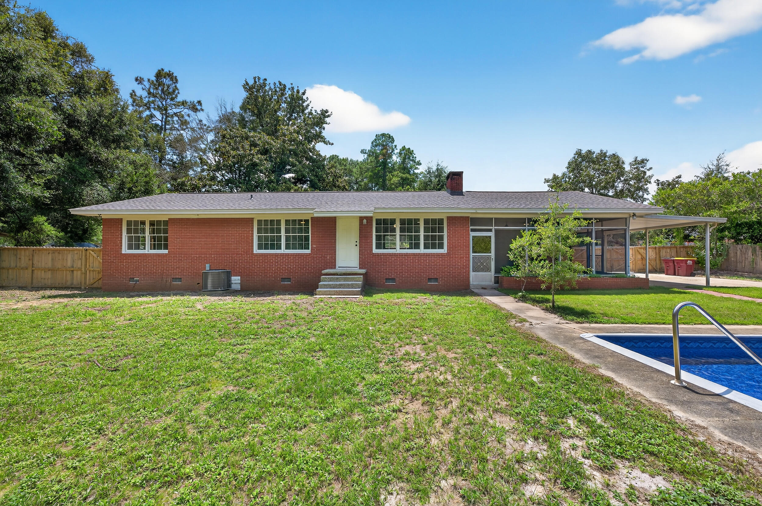 758 9th Avenue Crestview, FL 32536 - Photo 44 of 55 a view of an house with backyard space and balcony