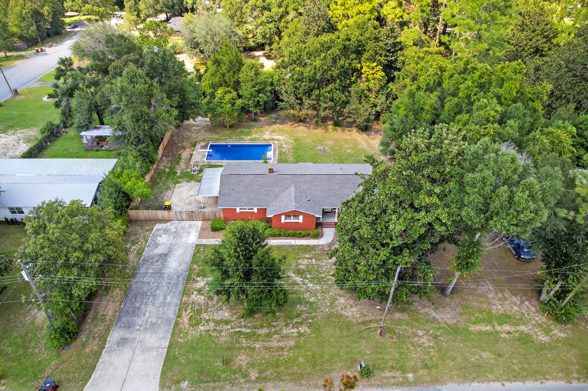 758 9th Avenue Crestview, FL 32536 - Photo 50 of 55 a view of swimming pool with a yard