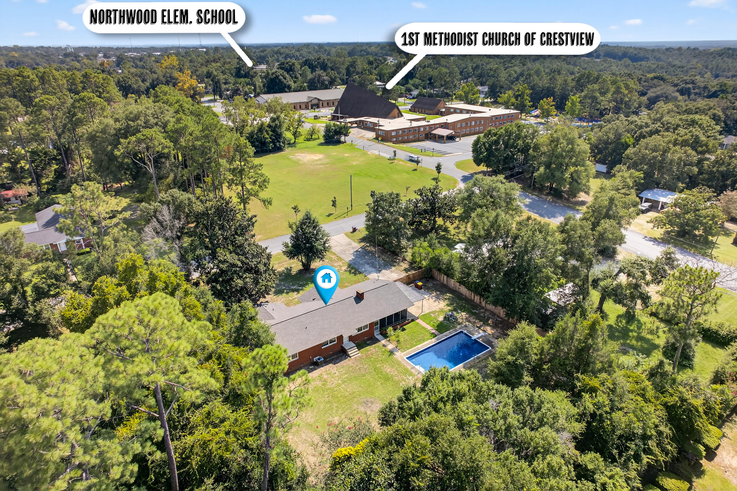 758 9th Avenue Crestview, FL 32536 - Photo 52 of 55 a view of a swimming pool with a yard and mountain