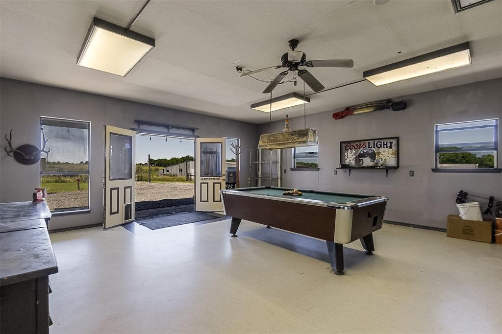 2403 Greathouse Road Waxahachie, TX 75167 - Photo 6 of 34 a living room with furniture and a flat screen tv