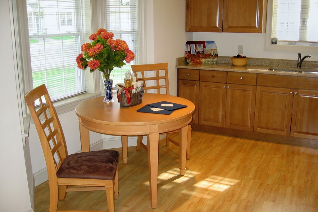 1 Abbott Lane, Unit 7 Concord, MA 01742 - Photo 4 of 10 a dining room with furniture and window