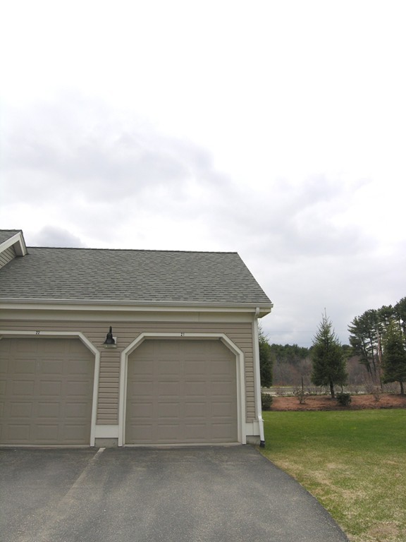 1 Abbott Lane, Unit 7 Concord, MA 01742 - Photo 8 of 10 a view of outdoor space yard and garage