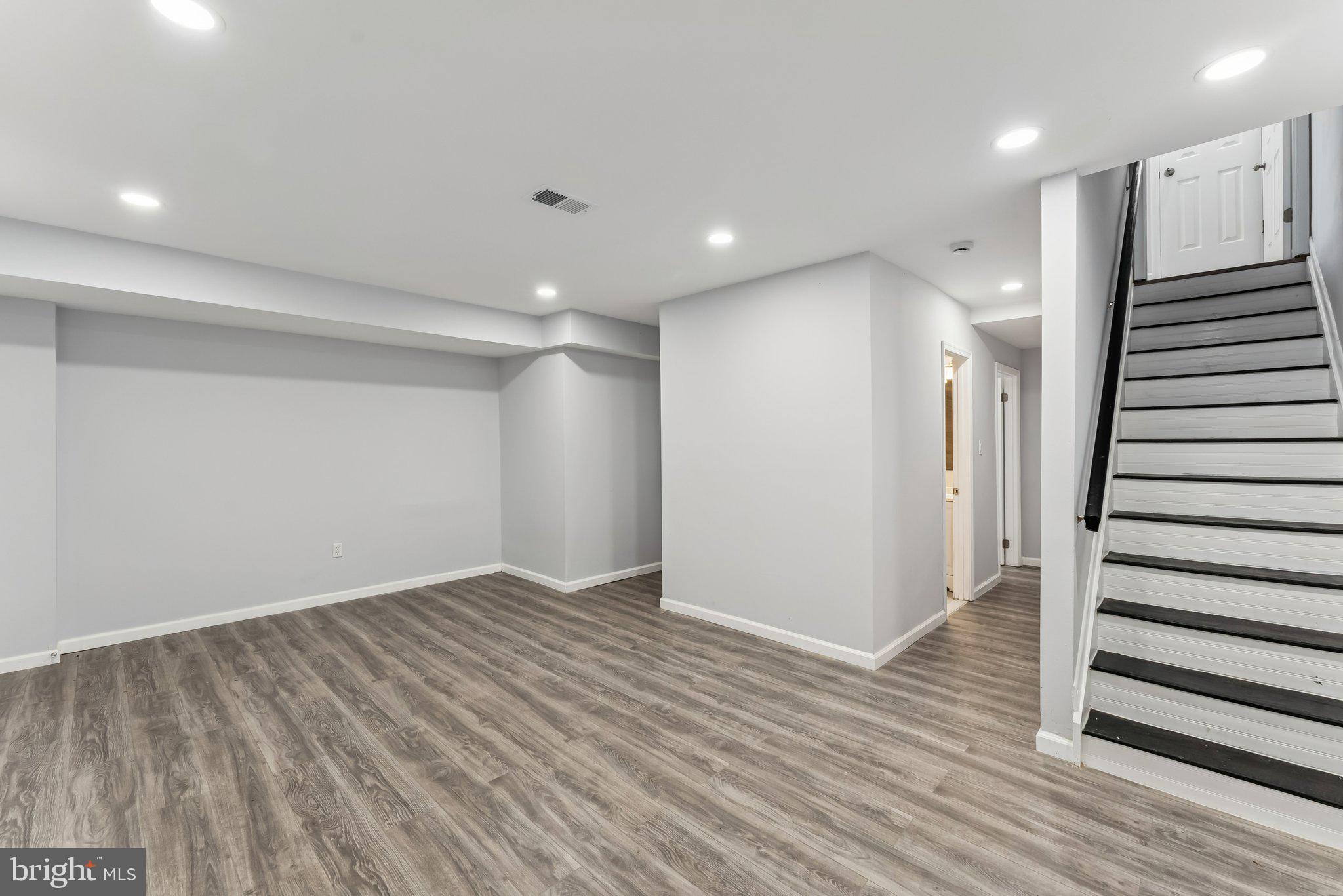 11400 Cosca Park Place Clinton, MD 20735 - Photo 17 of 22 an empty room with wooden floor