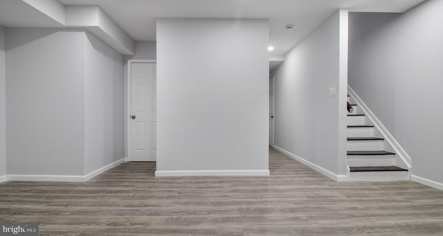 11400 Cosca Park Place Clinton, MD 20735 - Photo 18 of 22 a view of entryway with wooden floor