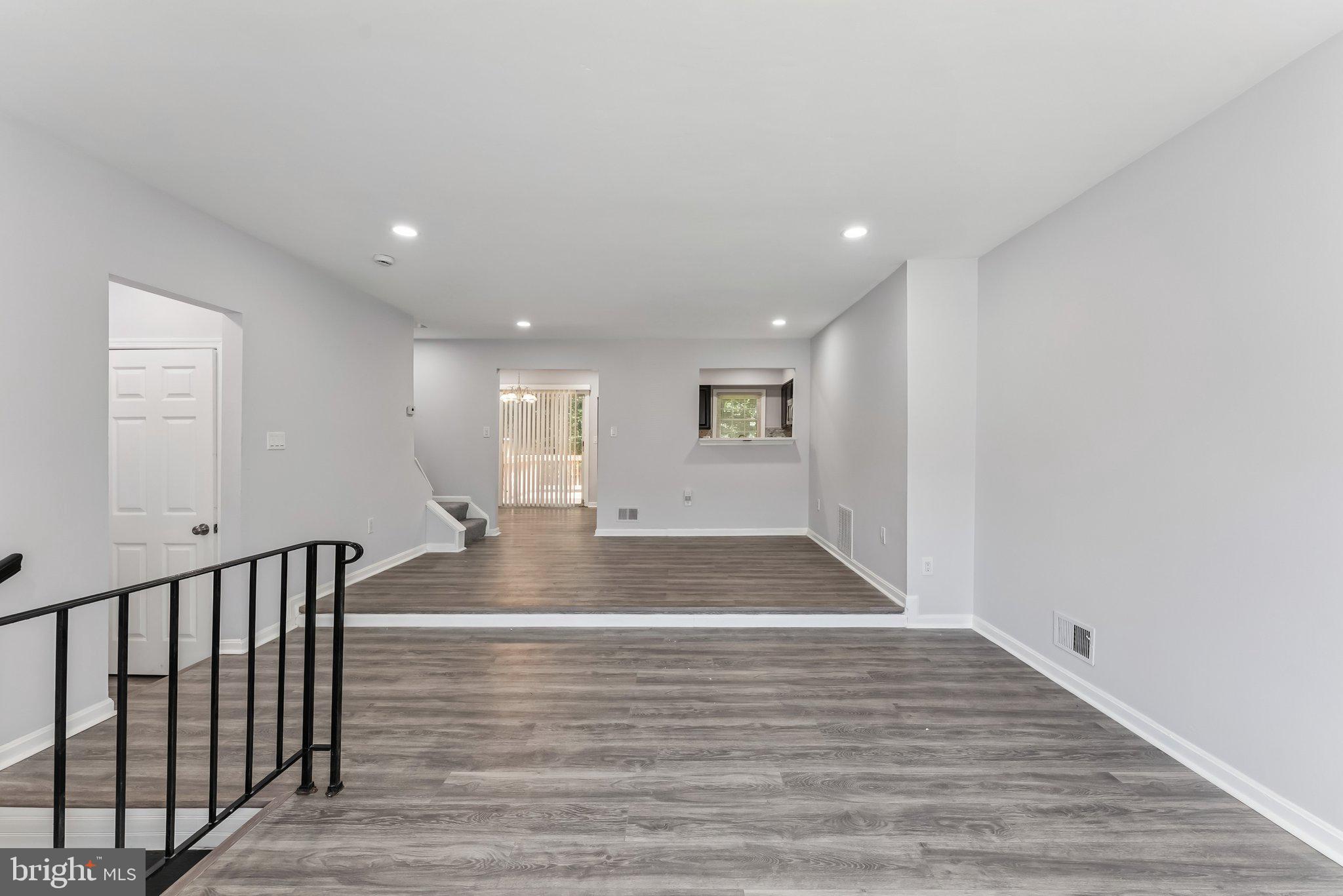 11400 Cosca Park Place Clinton, MD 20735 - Photo 3 of 22 a view of outdoor space with wooden floor and window
