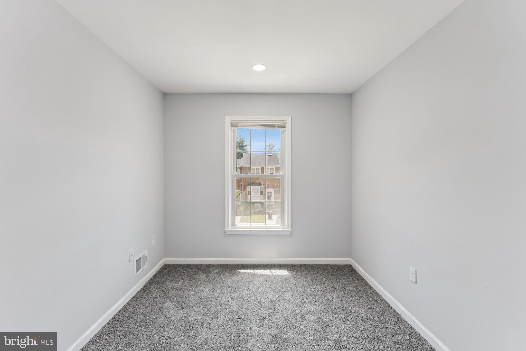 11400 Cosca Park Place Clinton, MD 20735 - Photo 9 of 22 an empty room with a window