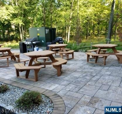 10 Lower Notch Road, Unit 15 Woodland Park, NJ 07424 - Photo 15 of 18 a view of a backyard with sitting area