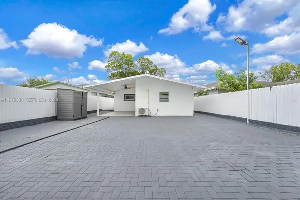 a house view with a outdoor space
