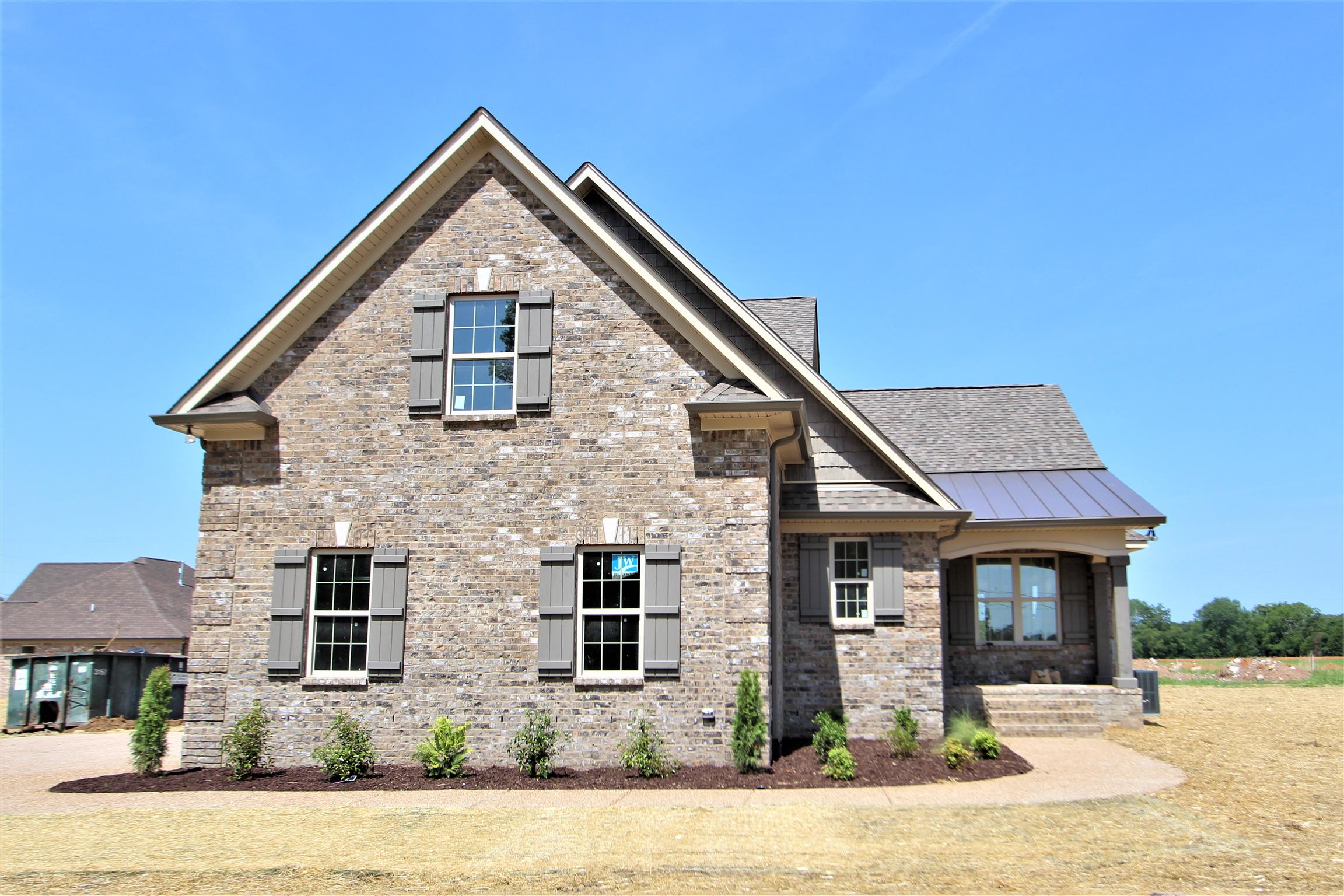 6620 Murfreesboro Road, Unit 29 Lebanon, TN 37090 - Photo 1 of 23 a front view of a house with a yard