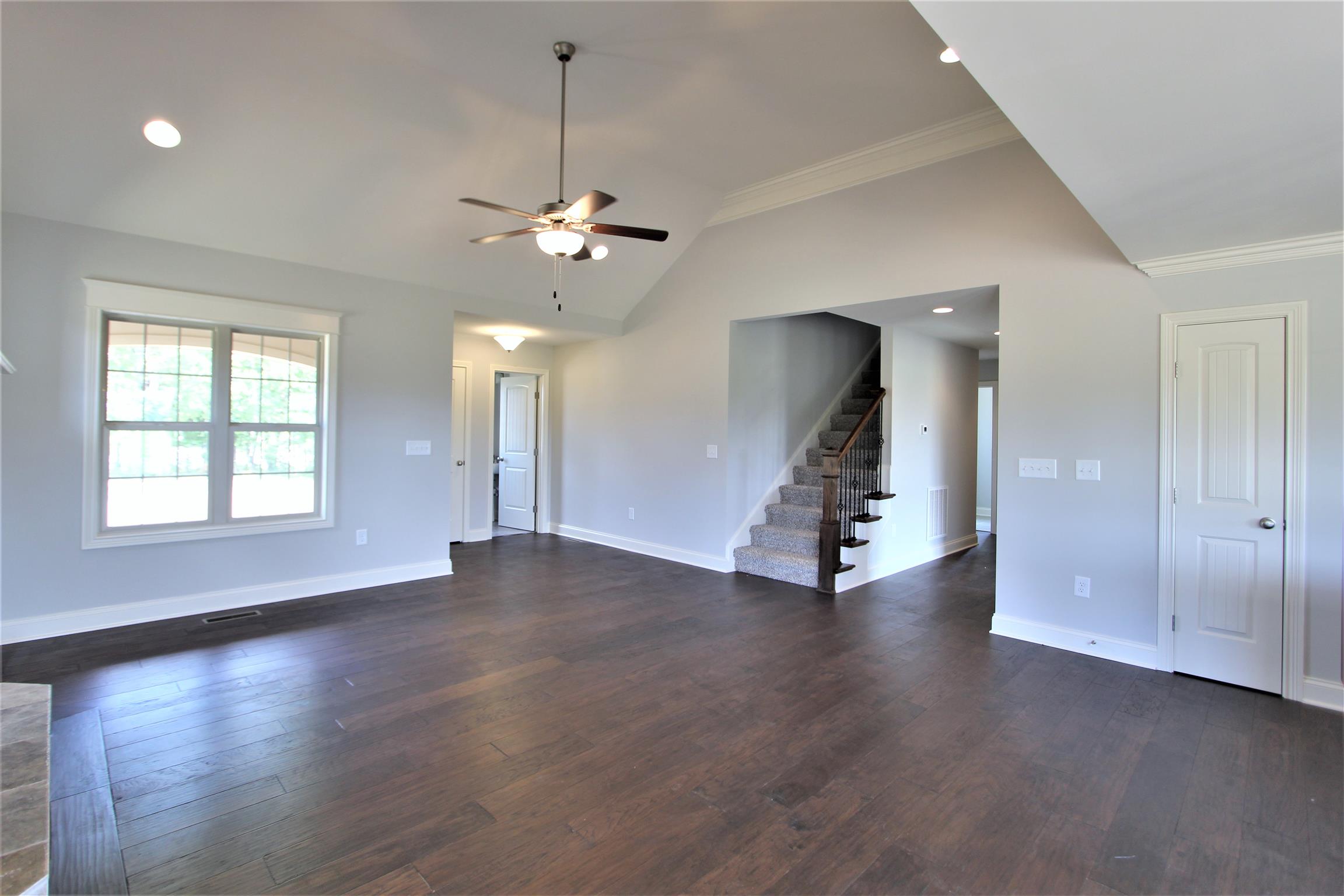 6620 Murfreesboro Road, Unit 29 Lebanon, TN 37090 - Photo 3 of 23 a view of an empty room with a window and wooden floor