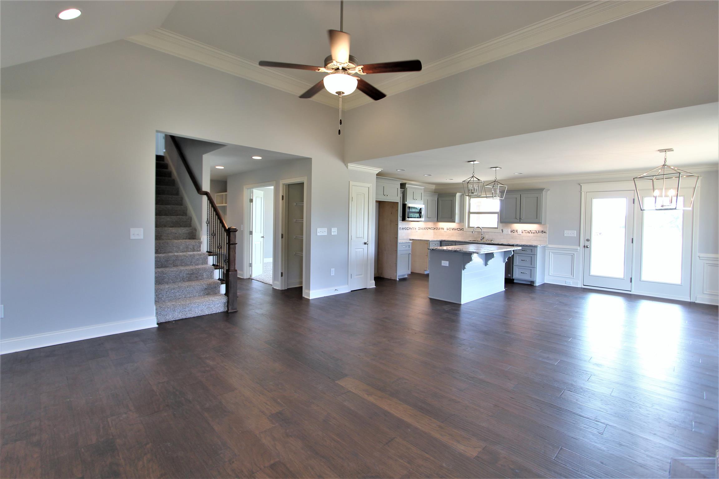 6620 Murfreesboro Road, Unit 29 Lebanon, TN 37090 - Photo 4 of 23 a view of empty room with wooden floor and fireplace