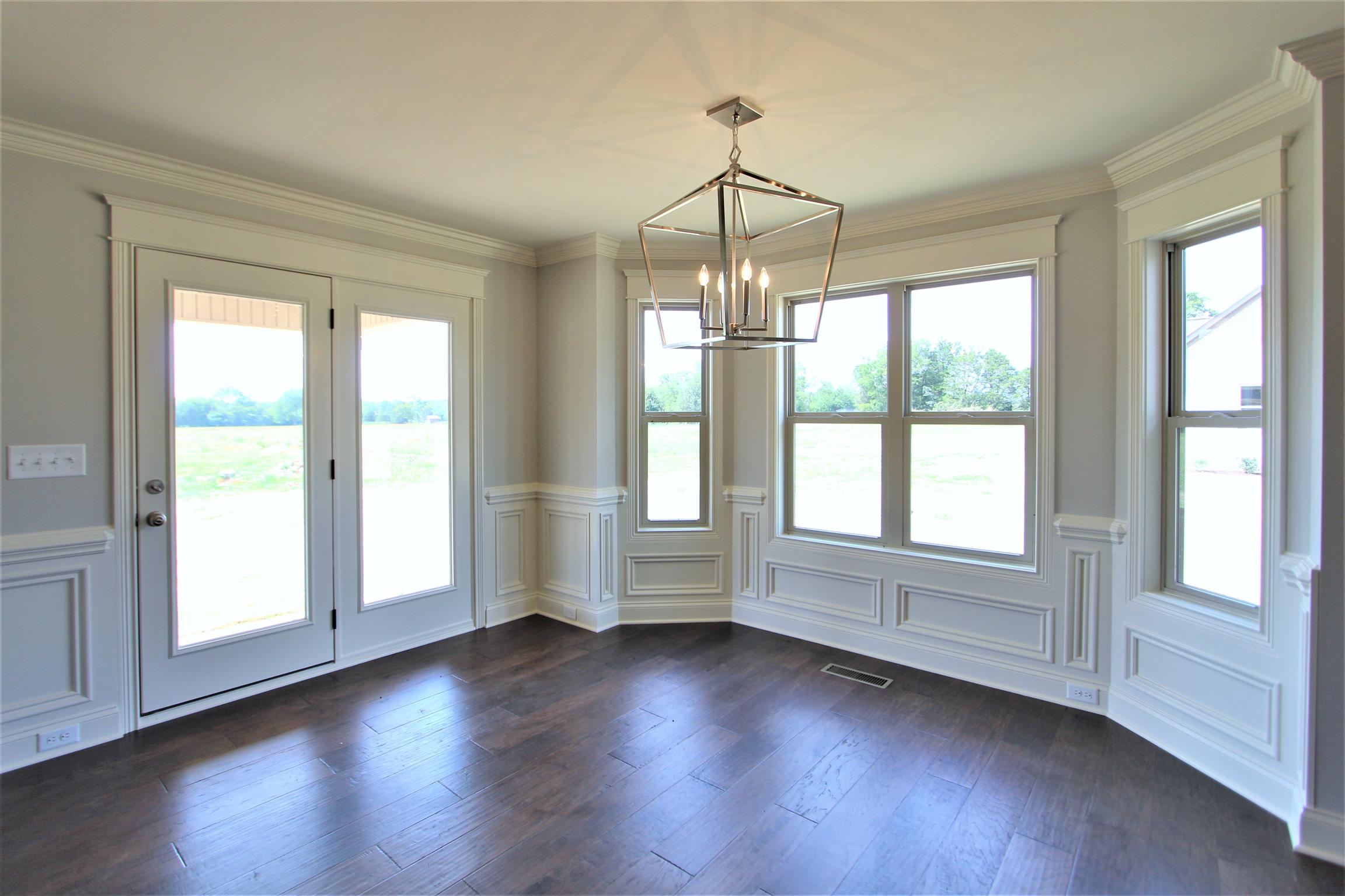 6620 Murfreesboro Road, Unit 29 Lebanon, TN 37090 - Photo 5 of 23 a view of empty room with wooden floor and fan