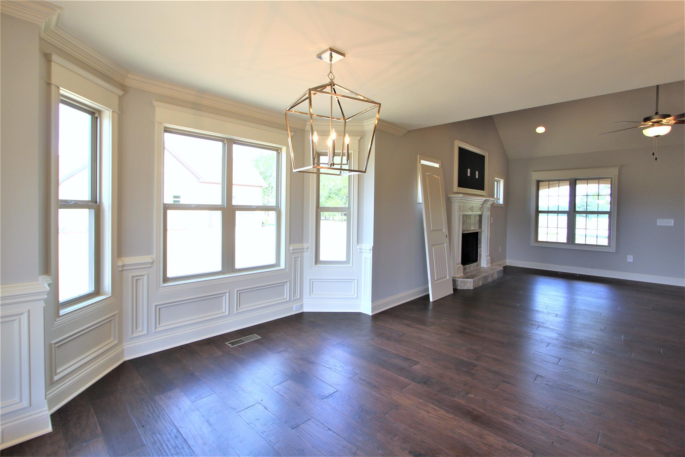 6620 Murfreesboro Road, Unit 29 Lebanon, TN 37090 - Photo 9 of 23 a view of an empty room with wooden floor and a window
