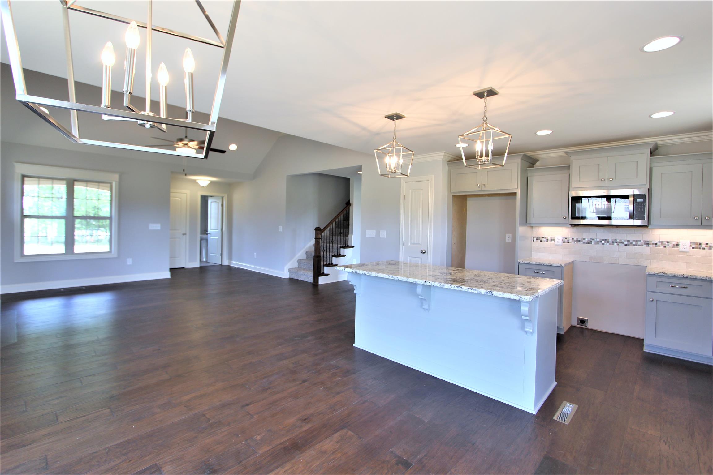 6620 Murfreesboro Road, Unit 29 Lebanon, TN 37090 - Photo 10 of 23 a large kitchen with granite countertop a large counter top a sink stainless steel appliances and cabinets