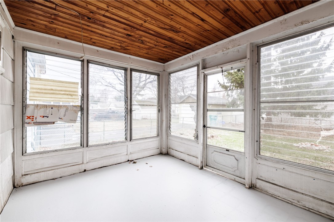 246 Thorndyke Road Irondequoit, NY 14617 - Photo 8 of 27 Back Porch with wood ceiling