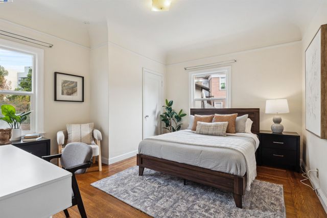 a bedroom with a bed and a couch