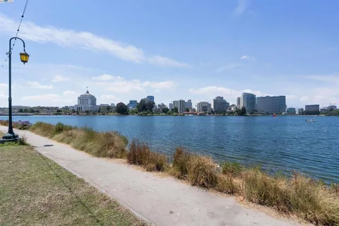 a view of a lake with a city