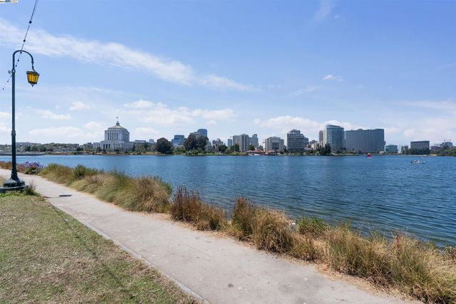 a view of a lake with a city