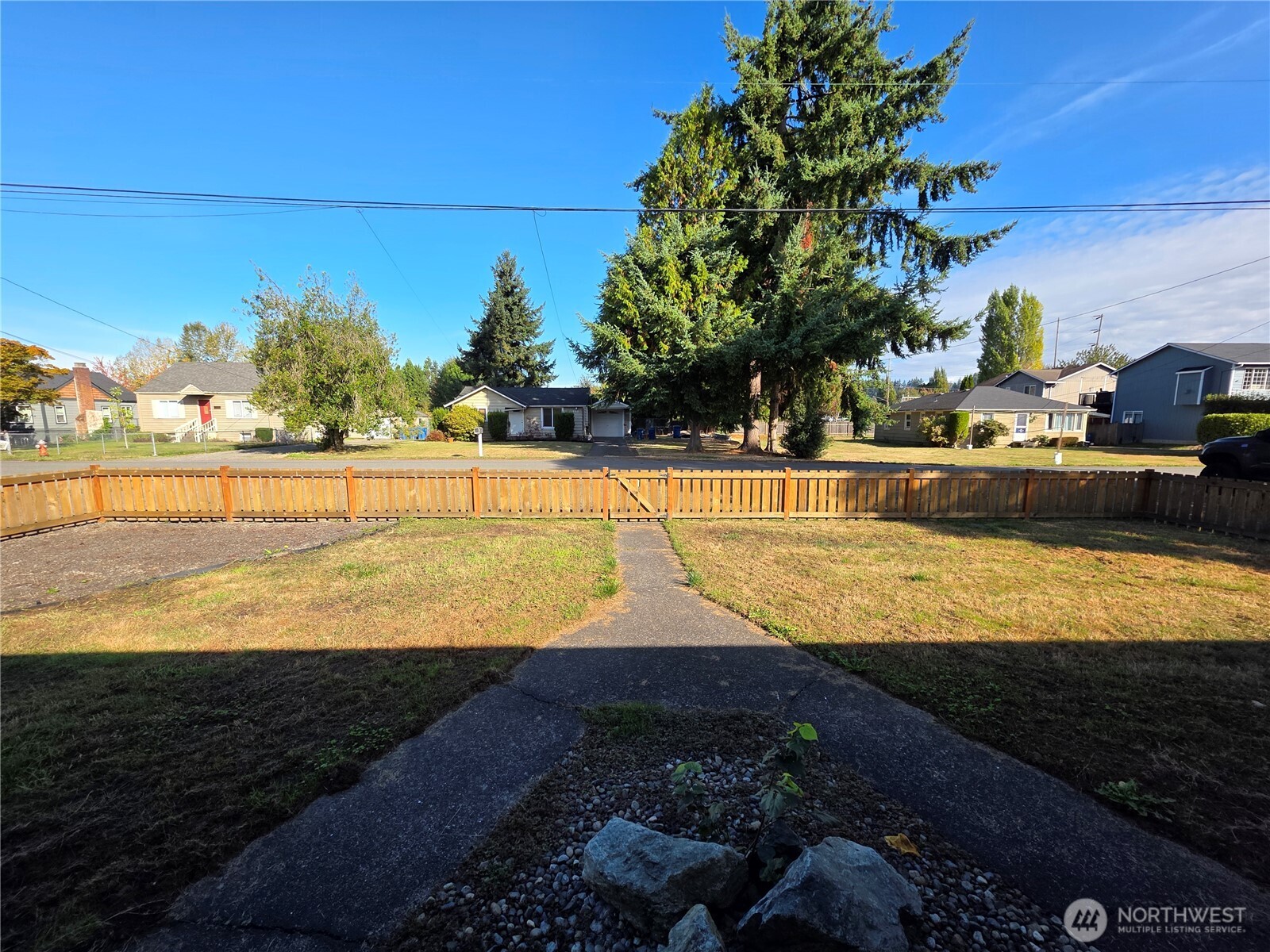 620 North Street Monroe, WA 98272 - Photo 38 of 38 a view of a swimming pool with an outdoor space and seating area