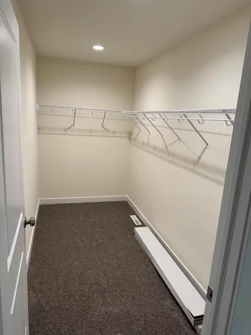 a view of a room with racks on the wall