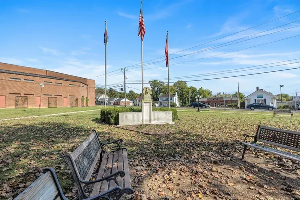 a view of a lake with a sitting area