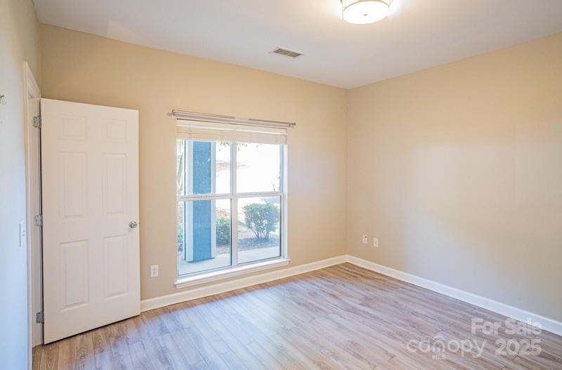 1125 Torrence Circle Davidson, NC 28036 - Photo 19 of 41 wooden floor in an empty room