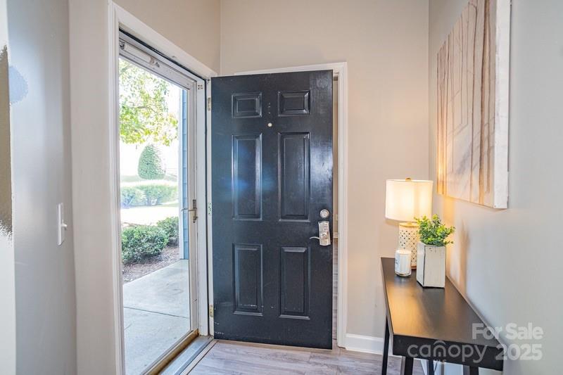 1125 Torrence Circle Davidson, NC 28036 - Photo 2 of 41 a view of a hallway and dining room