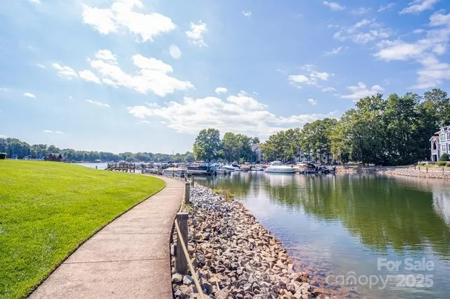 a view of a lake with a yard