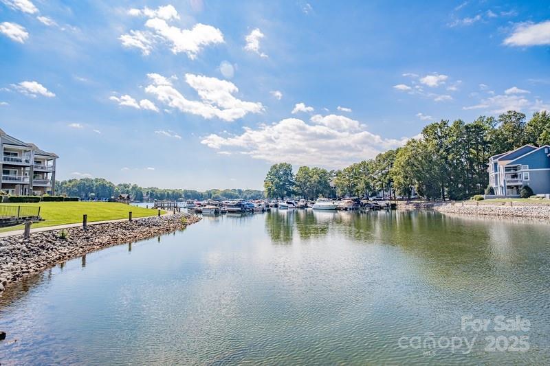 1125 Torrence Circle Davidson, NC 28036 - Photo 35 of 41 a view of a house with swimming pool and a yard