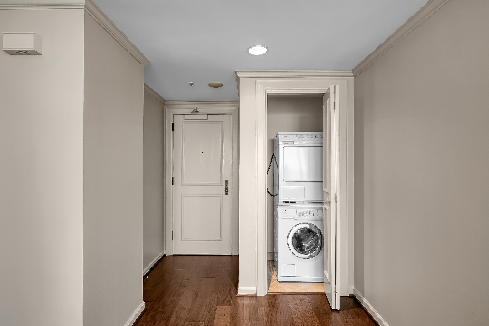 1111 Caroline Street, Unit 2901 Houston, TX 77010 - Photo 22 of 46 a view of an empty room and wooden floor