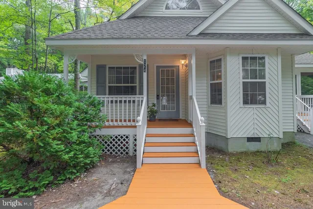 a view of a house with a porch