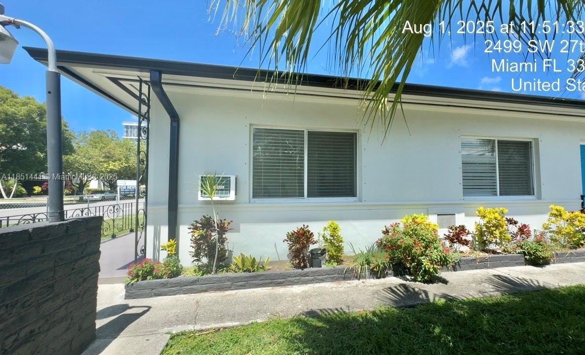 2499 Southwest 27th Street, Unit 9 Miami, FL 33133 - Photo 5 of 19 a front view of a house