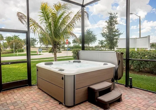 a view of a backyard with a garden and trees