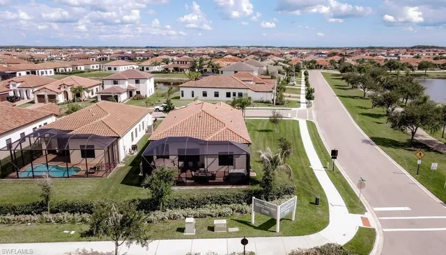a aerial view of a house with a yard