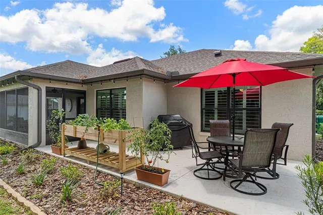 a view of a garden with a lake