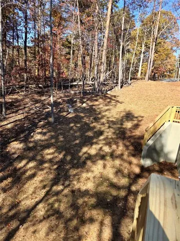 a view of outdoor space with lots of trees