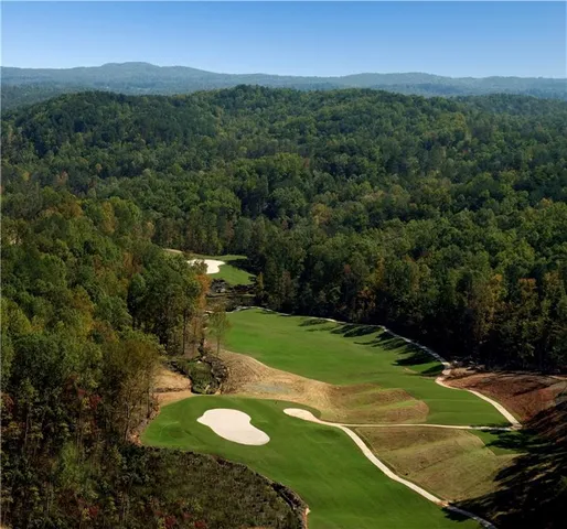 a living room filled with furniture and a window