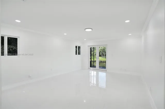 an empty room with windows