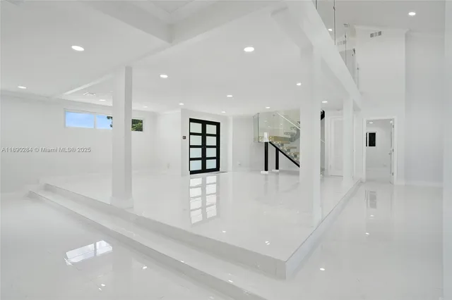 a view of kitchen and windows