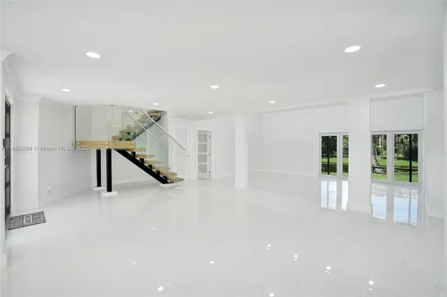 a view of an entryway with stairs