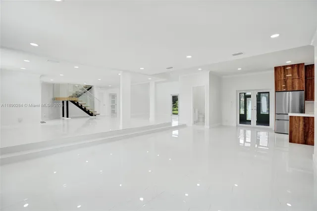 a view of a living room and a kitchen
