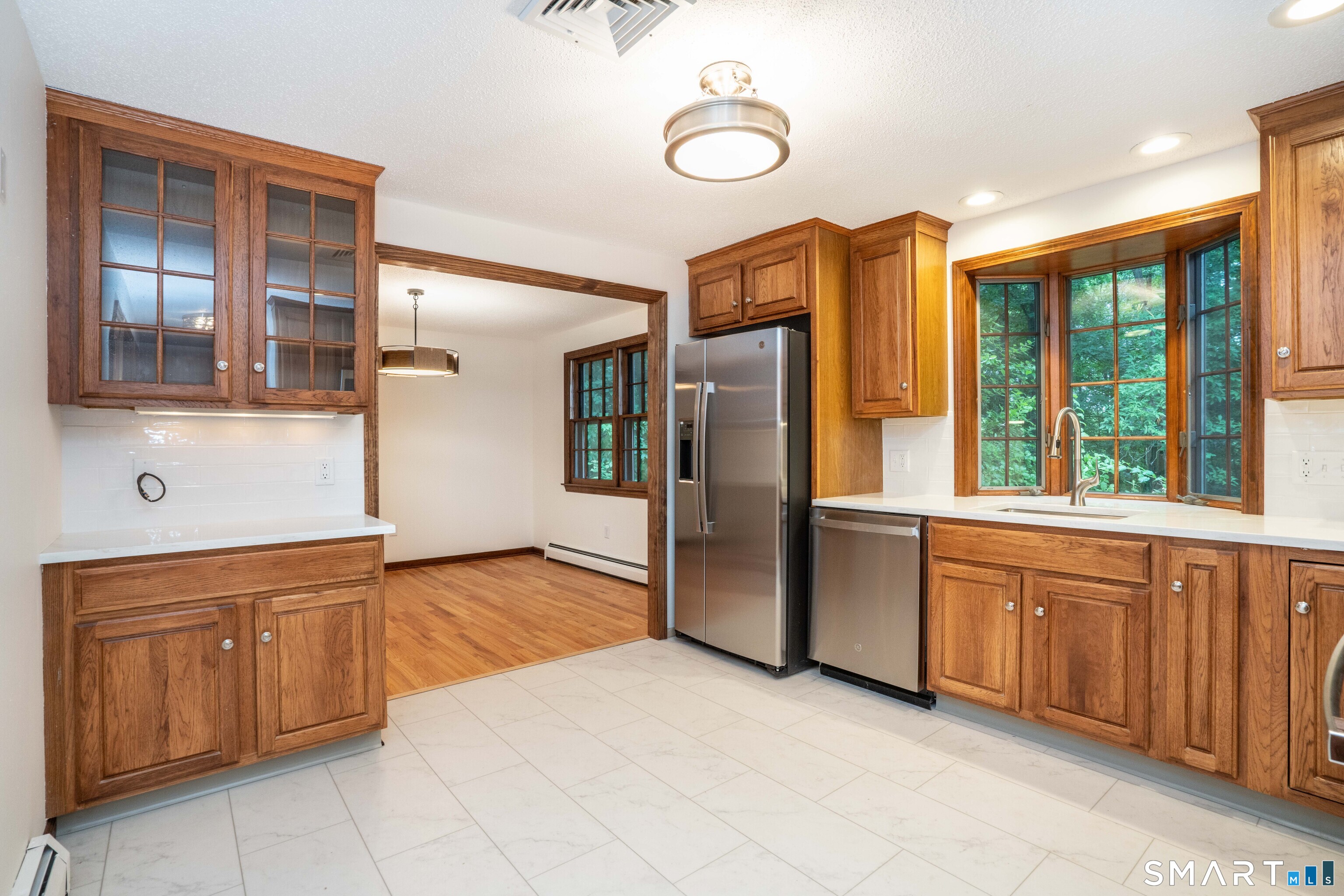 182 Valley View Road Manchester, CT 06040 - Photo 11 of 40 Kitchen view into Dining Room